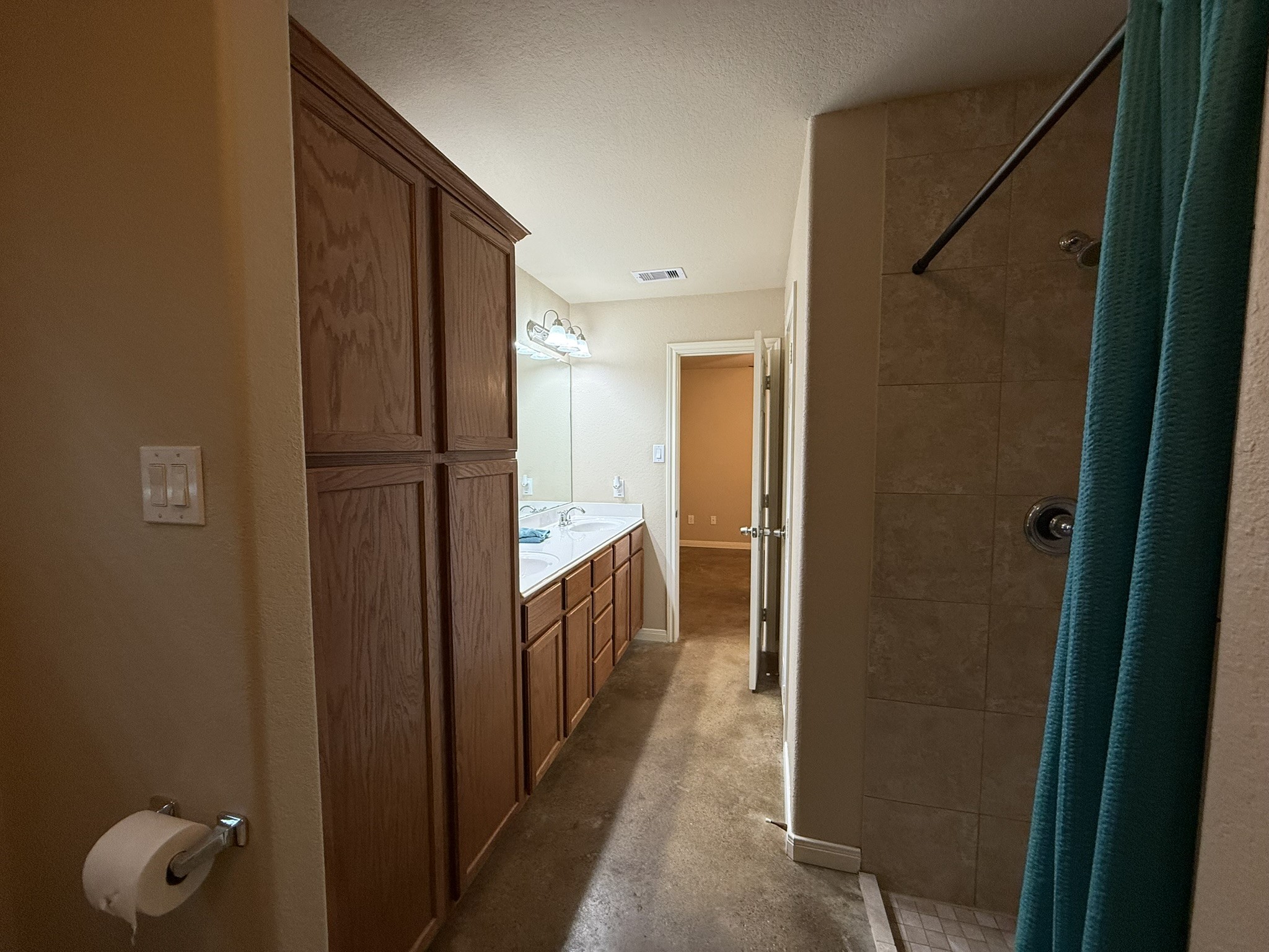 11817 13th Street Santa Fe, TX 77510 - Photo 14 of 23 Upgraded tile shower and lots of storage in the primary bathroom.