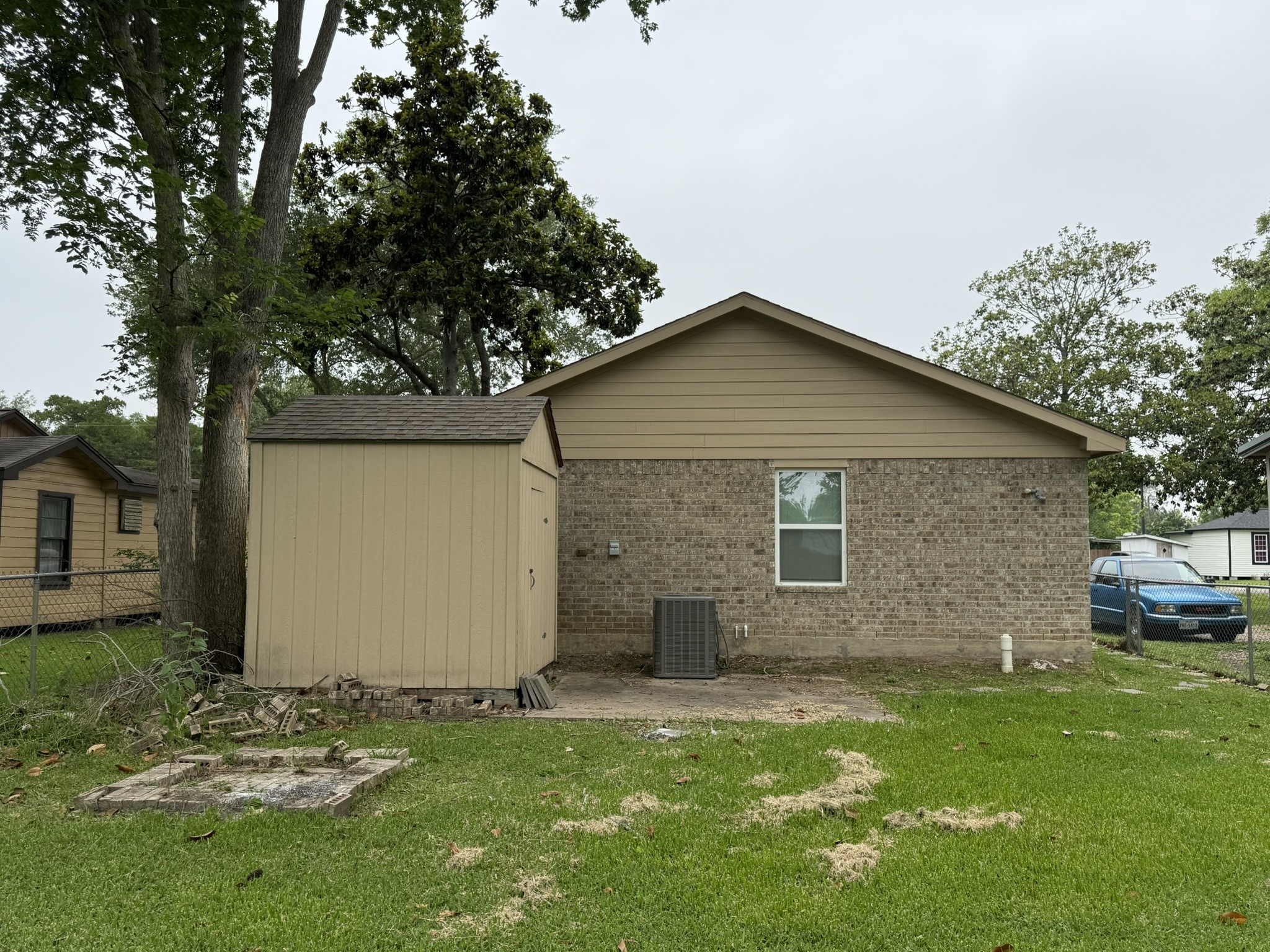 11817 13th Street Santa Fe, TX 77510 - Photo 19 of 23 Backyard has a storage shed.