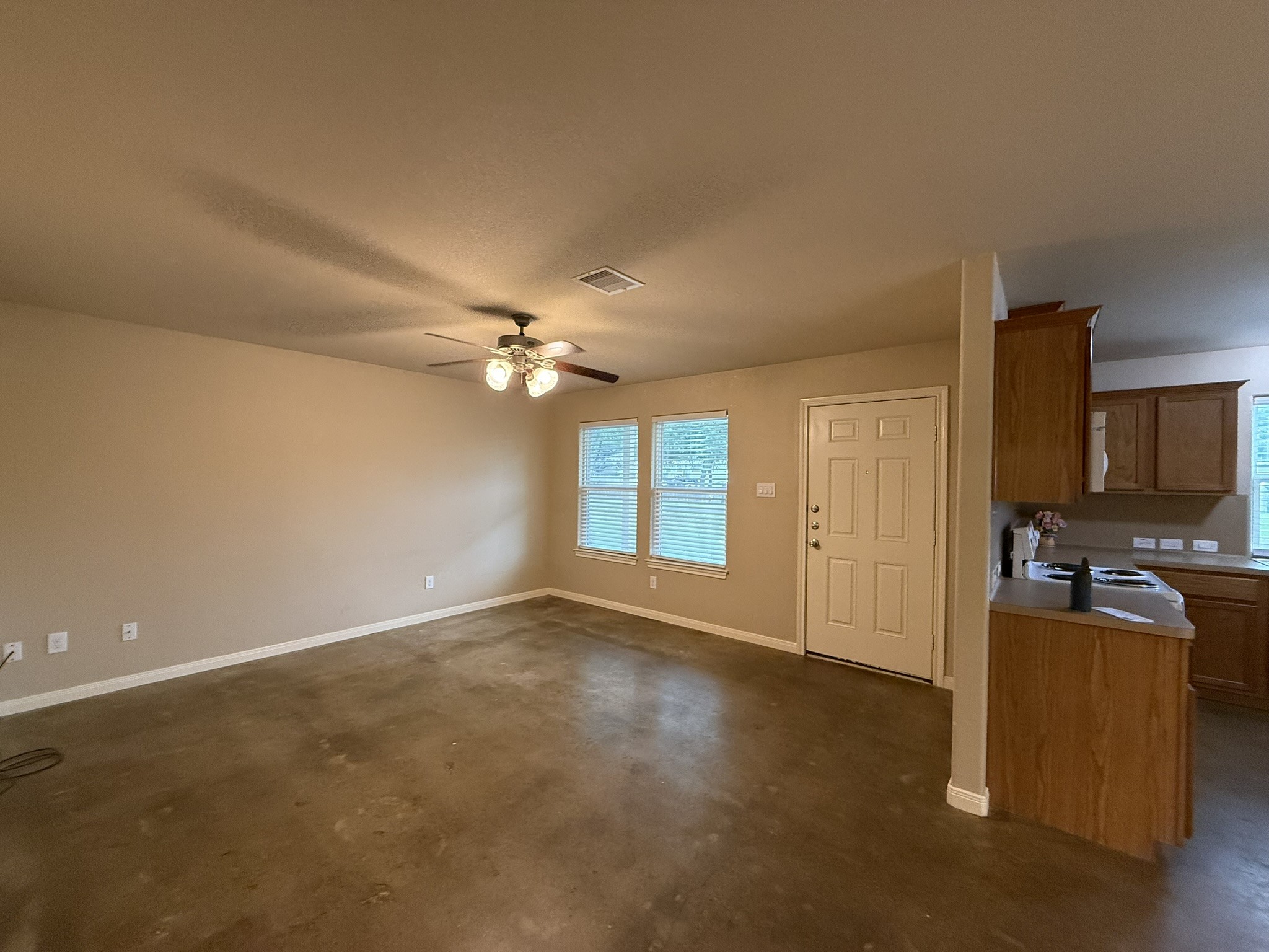 11817 13th Street Santa Fe, TX 77510 - Photo 4 of 23 Living room is open to kitchen and dining room.