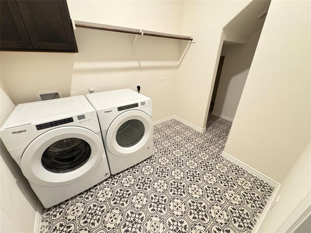 3823 Tack Aubrey, TX 76227 - Photo 20 of 27 a utility room with dryer and washer