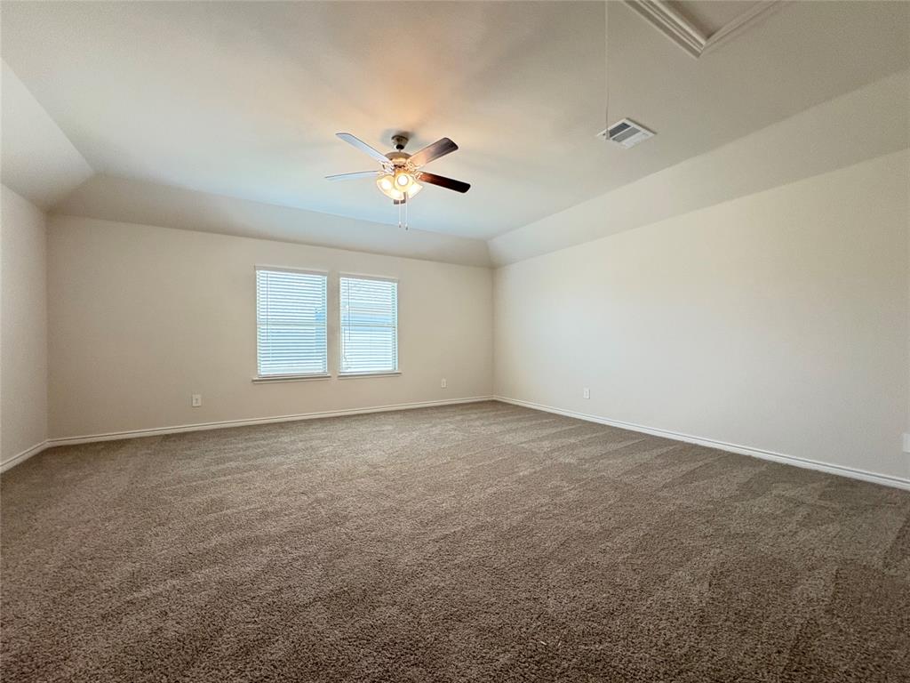 3823 Tack Aubrey, TX 76227 - Photo 3 of 27 a view of an empty room with a window