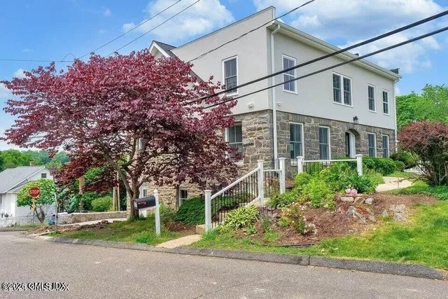front view of a house with a street