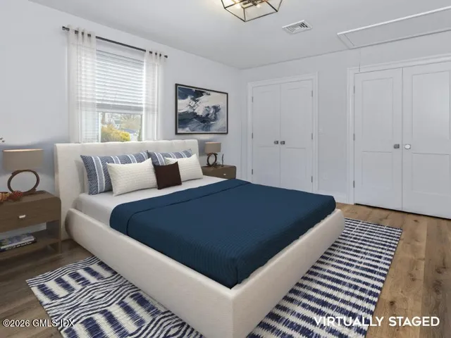 a view of a white house covered in snow