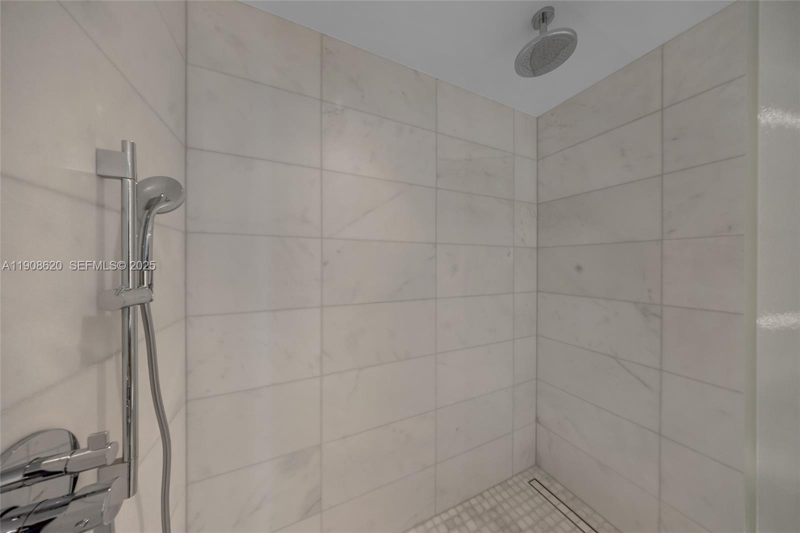 500 Alton Road, Unit 1904 Miami Beach, FL 33139 - Photo 19 of 28 a bathroom with a shower