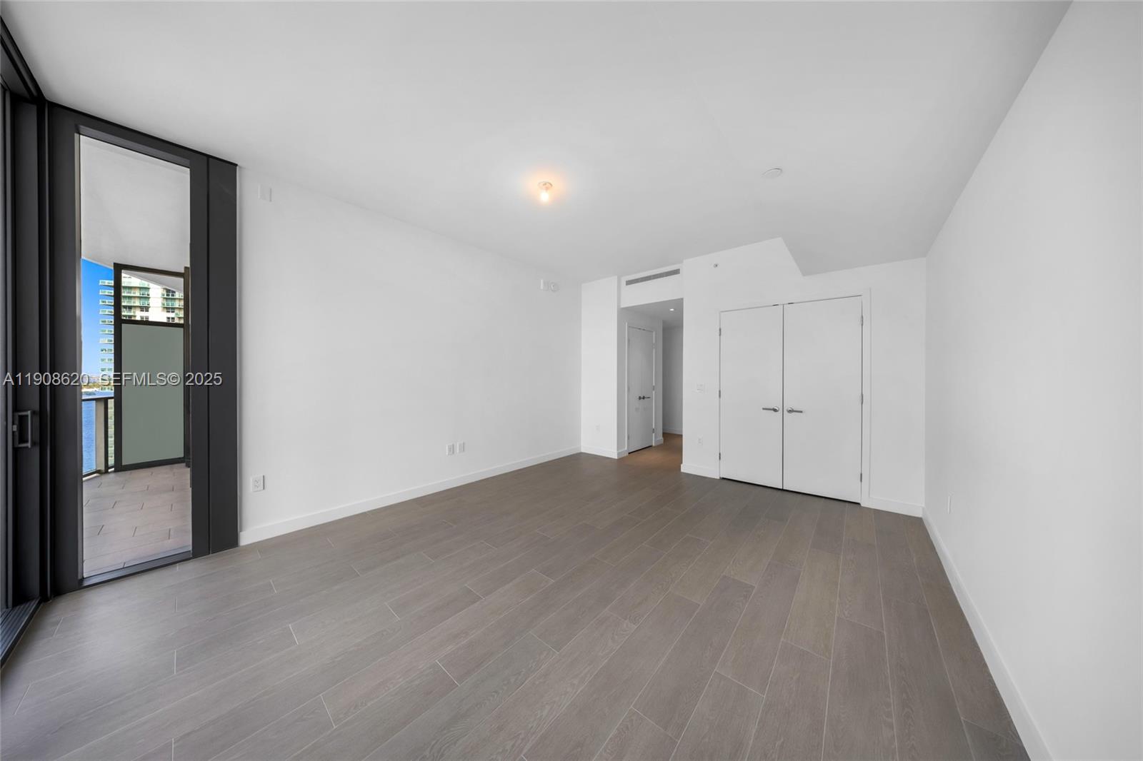 500 Alton Road, Unit 1904 Miami Beach, FL 33139 - Photo 23 of 28 a view of an empty room and window