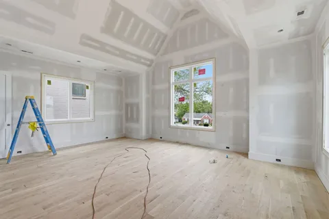 a bathroom with a shower and vanity