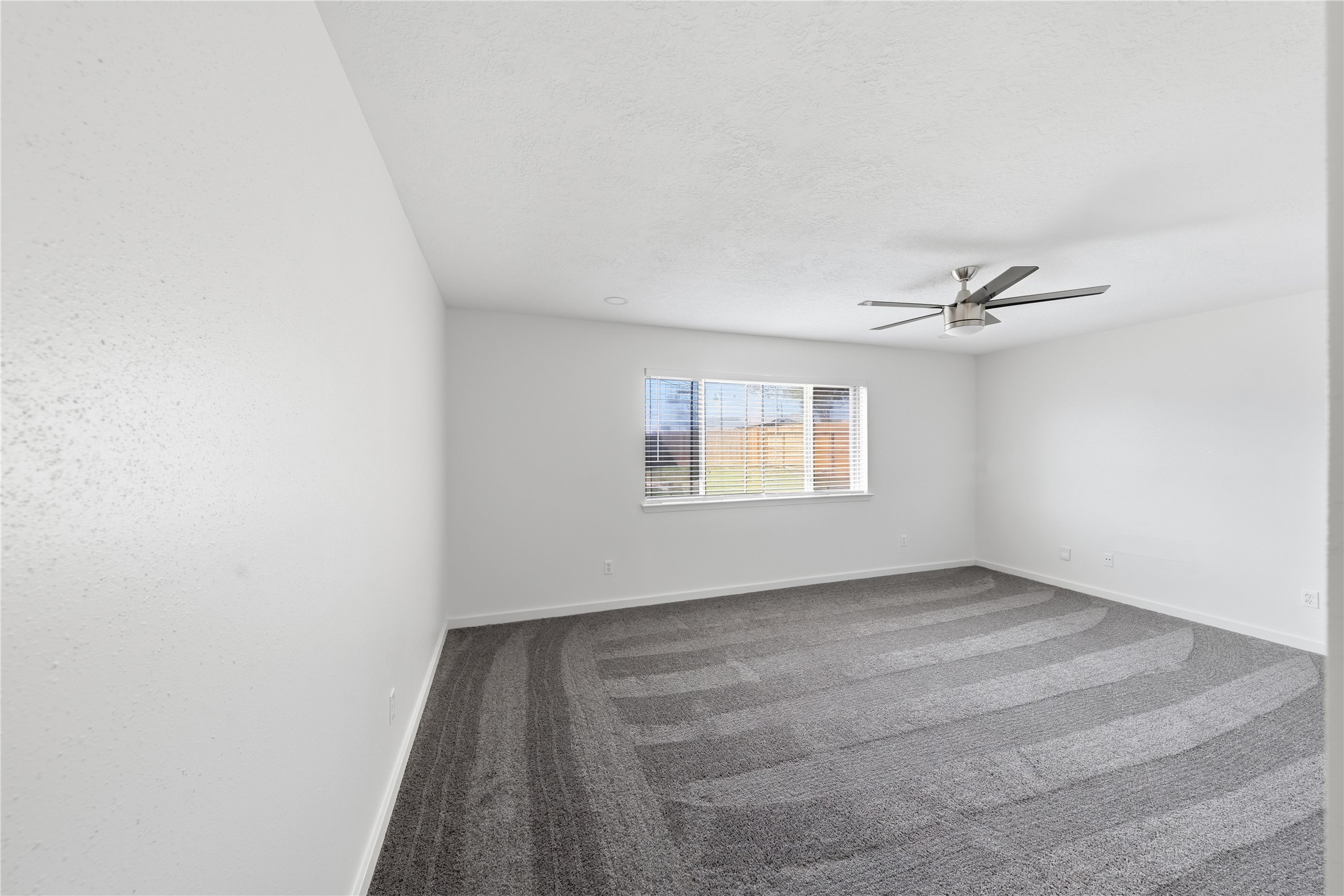 2303 Keyhole Lane Houston, TX 77084 - Photo 13 of 28 an empty room with a window