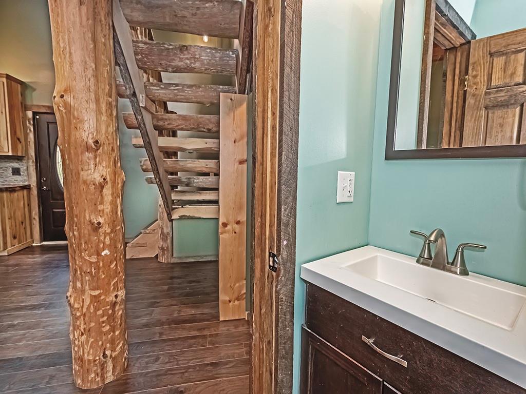 179 Rocks Road Parker, PA 16049 - Photo 15 of 29 a bathroom with a sink and a mirror