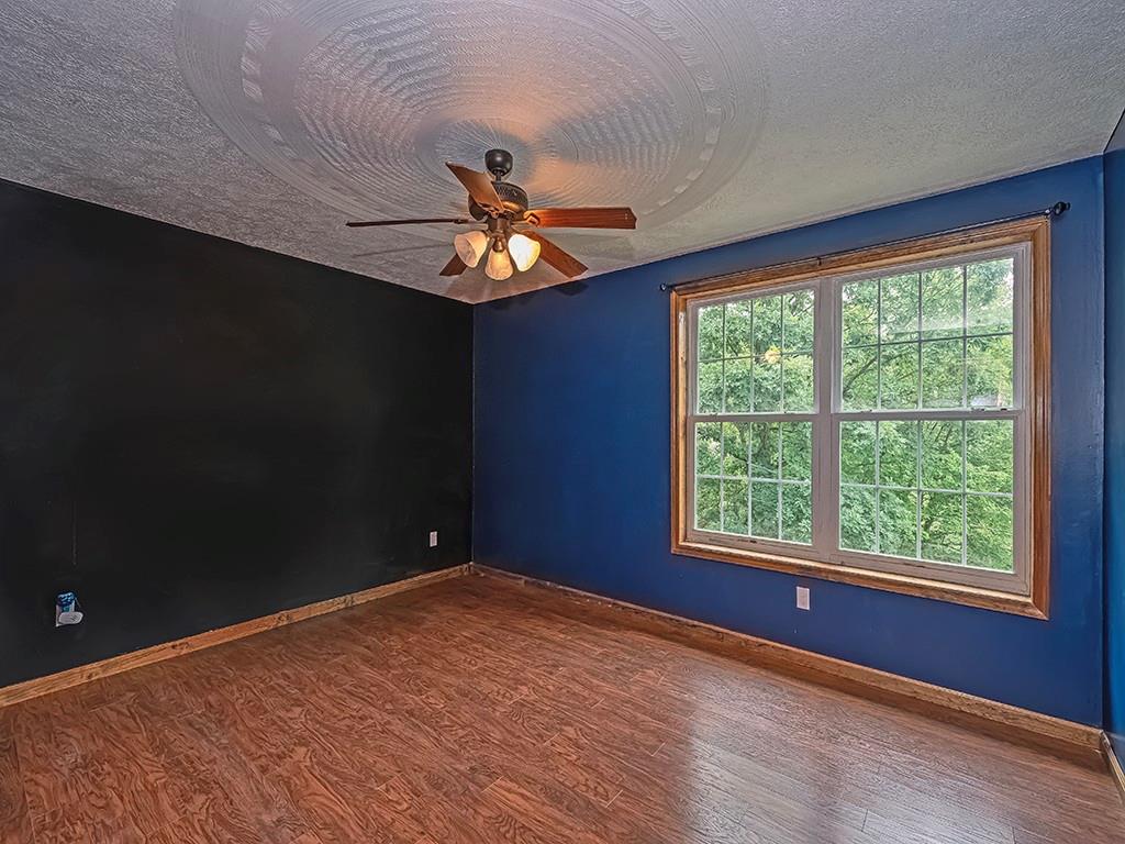 179 Rocks Road Parker, PA 16049 - Photo 21 of 29 a view of an empty room with a window
