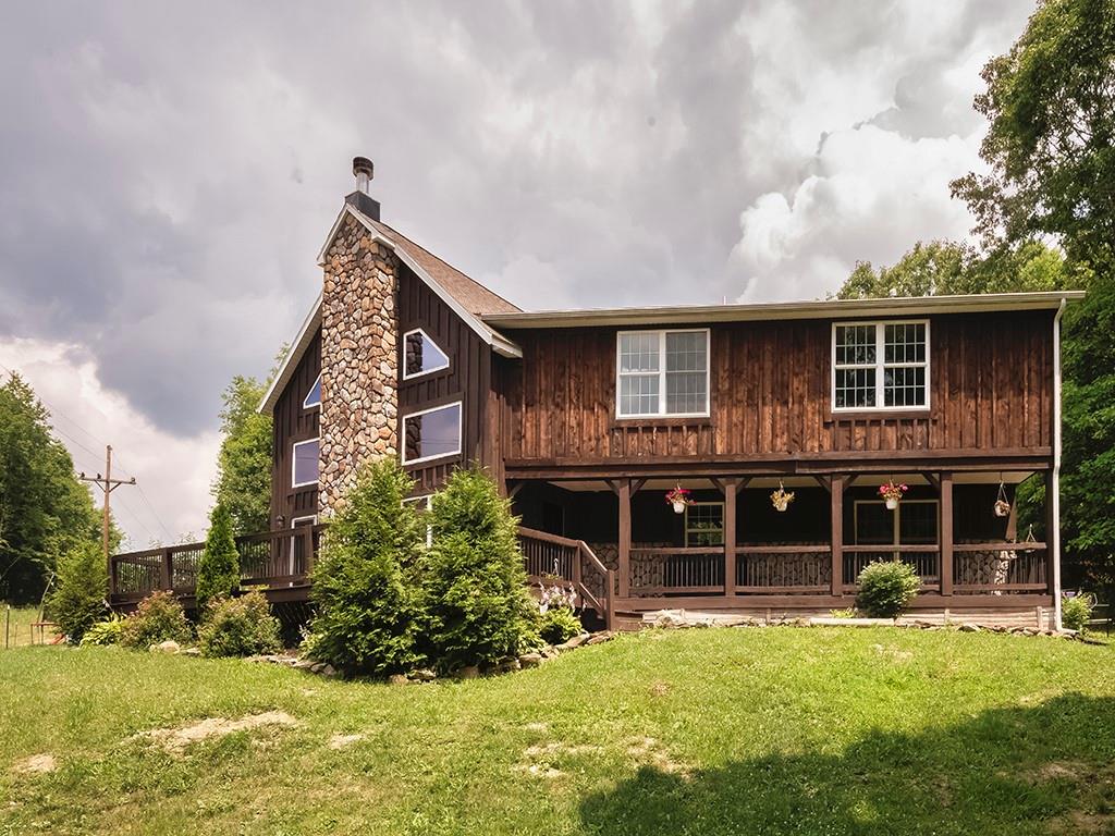 179 Rocks Road Parker, PA 16049 - Photo 29 of 29 a front view of a house with a yard