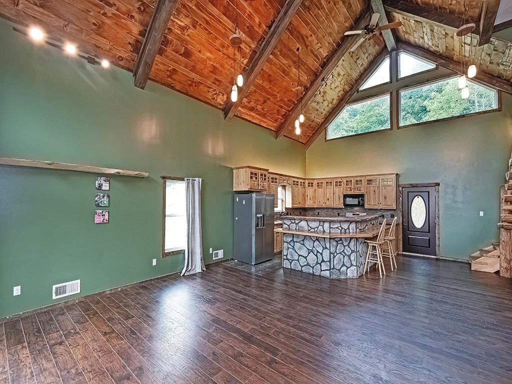 179 Rocks Road Parker, PA 16049 - Photo 10 of 29 a view of room with window and wooden floor