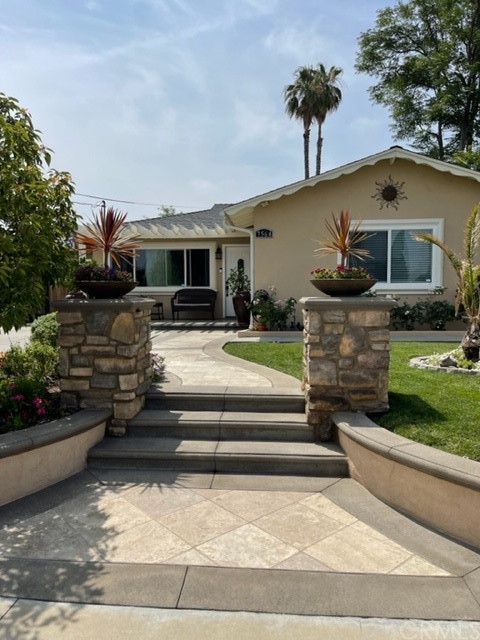 7564 Fern Avenue Riverside, CA 92504 - Photo 1 of 1 a view of a house with backyard and sitting area