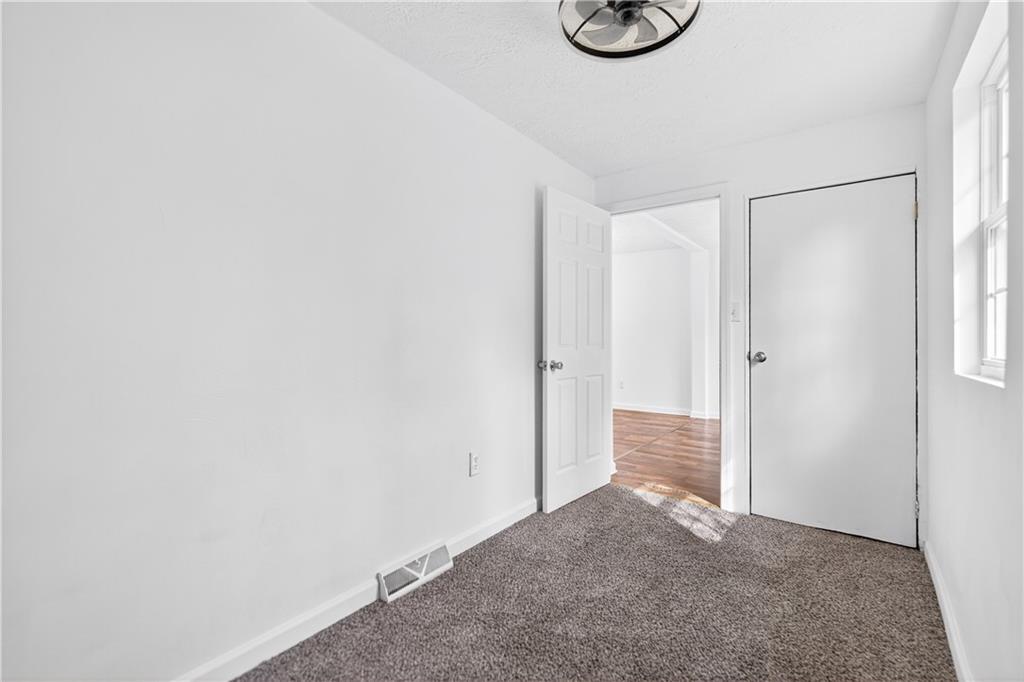 235 Little Summit Road Dunbar, PA 15431 - Photo 21 of 31 a view of room with floor to ceiling window