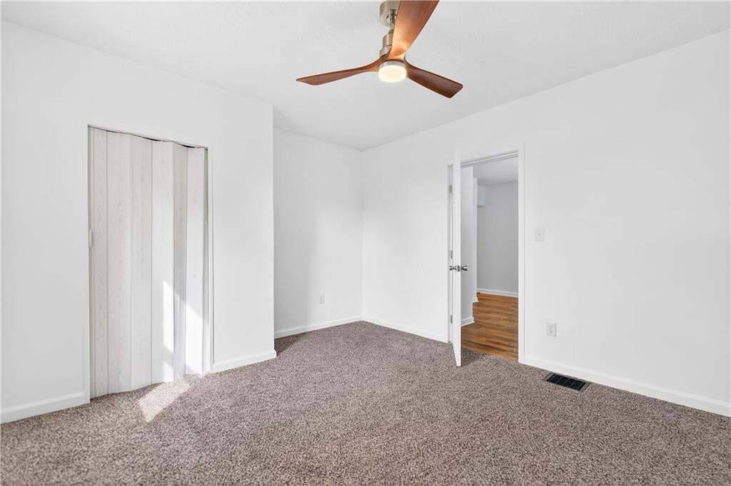 235 Little Summit Road Dunbar, PA 15431 - Photo 23 of 31 a view of empty room with ceiling fan