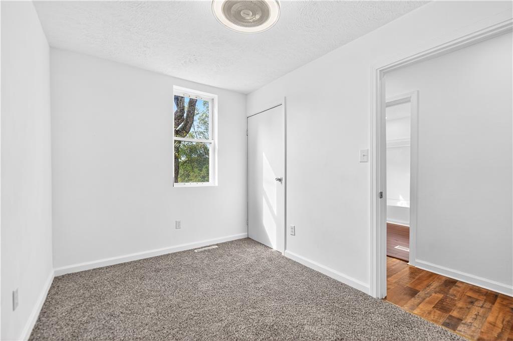 235 Little Summit Road Dunbar, PA 15431 - Photo 25 of 31 an empty room with windows