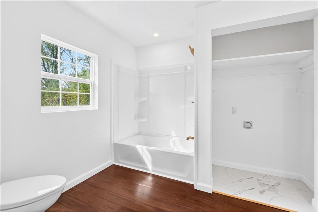 235 Little Summit Road Dunbar, PA 15431 - Photo 28 of 31 a bathroom with a bathtub and a shower