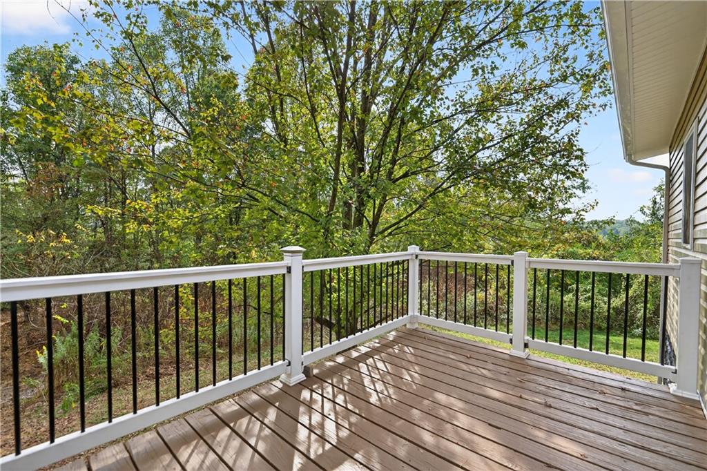 235 Little Summit Road Dunbar, PA 15431 - Photo 7 of 31 a view of balcony with wooden floor and fence