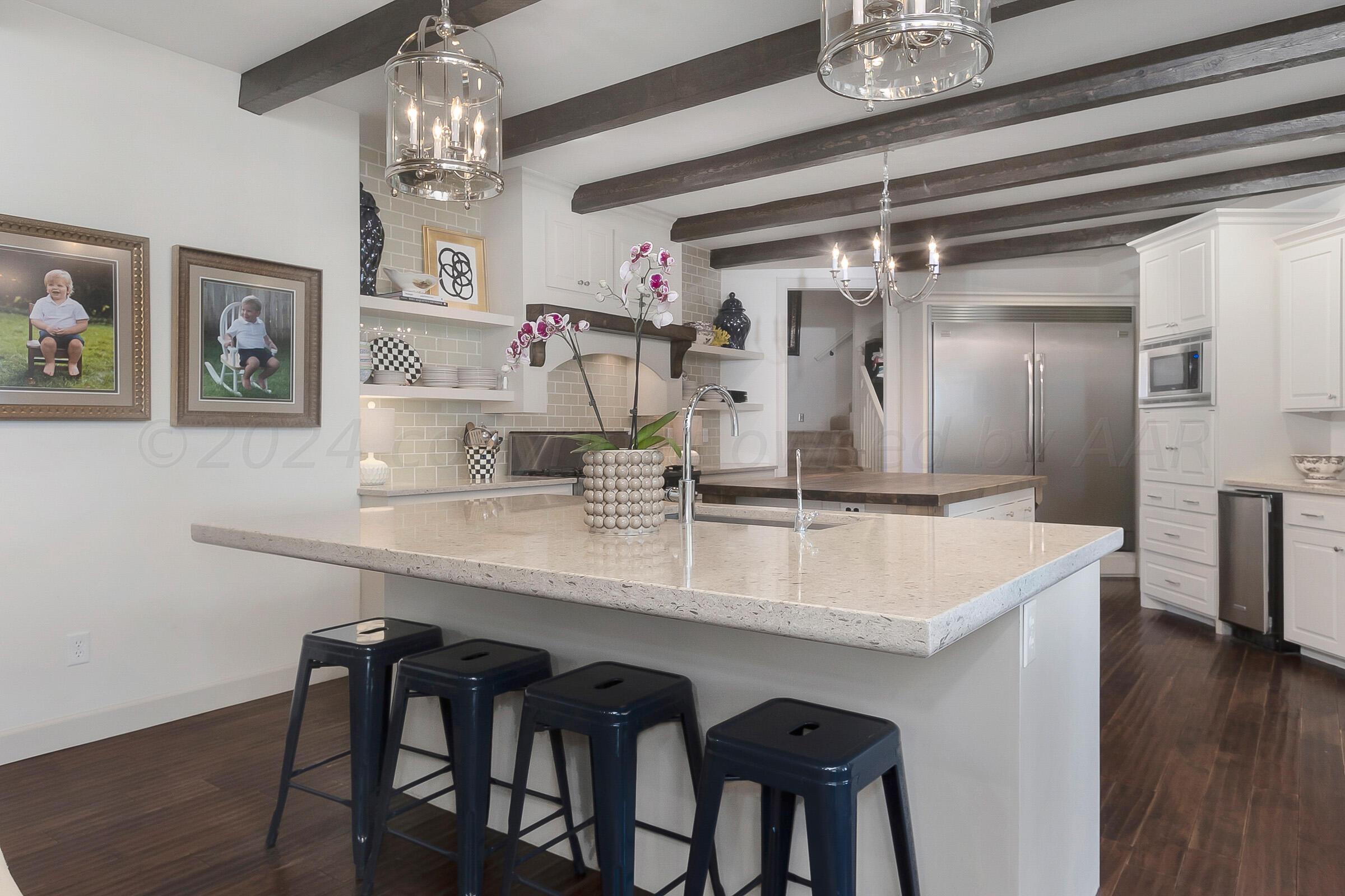 6107 Blue Sage Circle Amarillo, TX 79124 - Photo 14 of 79 a kitchen with a table and chairs in it