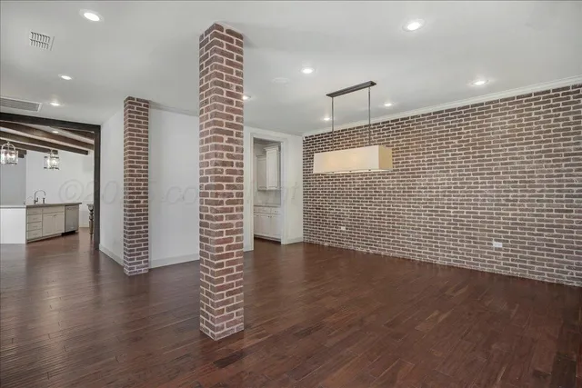 a view of room with window and ceiling fan