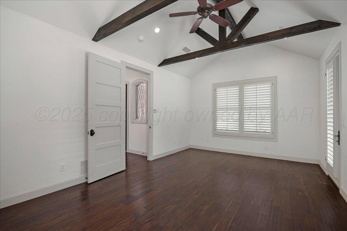 6107 Blue Sage Circle Amarillo, TX 79124 - Photo 41 of 79 a view of an empty room with wooden floor and a window