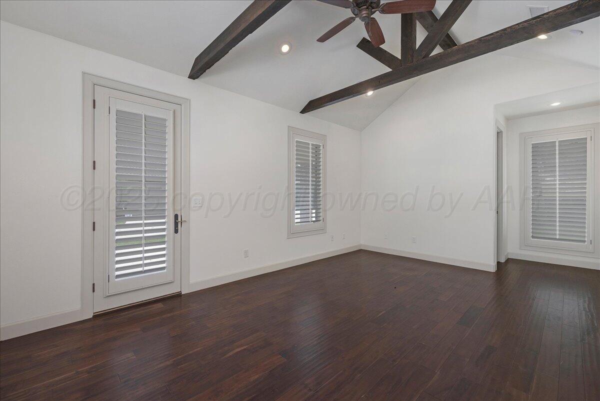 6107 Blue Sage Circle Amarillo, TX 79124 - Photo 42 of 79 an empty room with wooden floor and windows