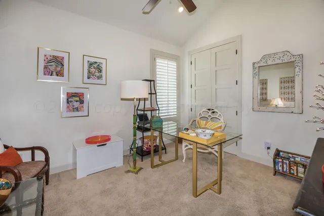 front view of a house with a garden