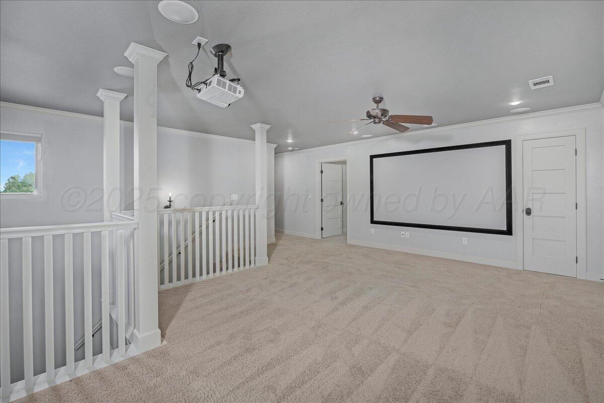 6107 Blue Sage Circle Amarillo, TX 79124 - Photo 51 of 79 a view of a hallway with paintings on the wall