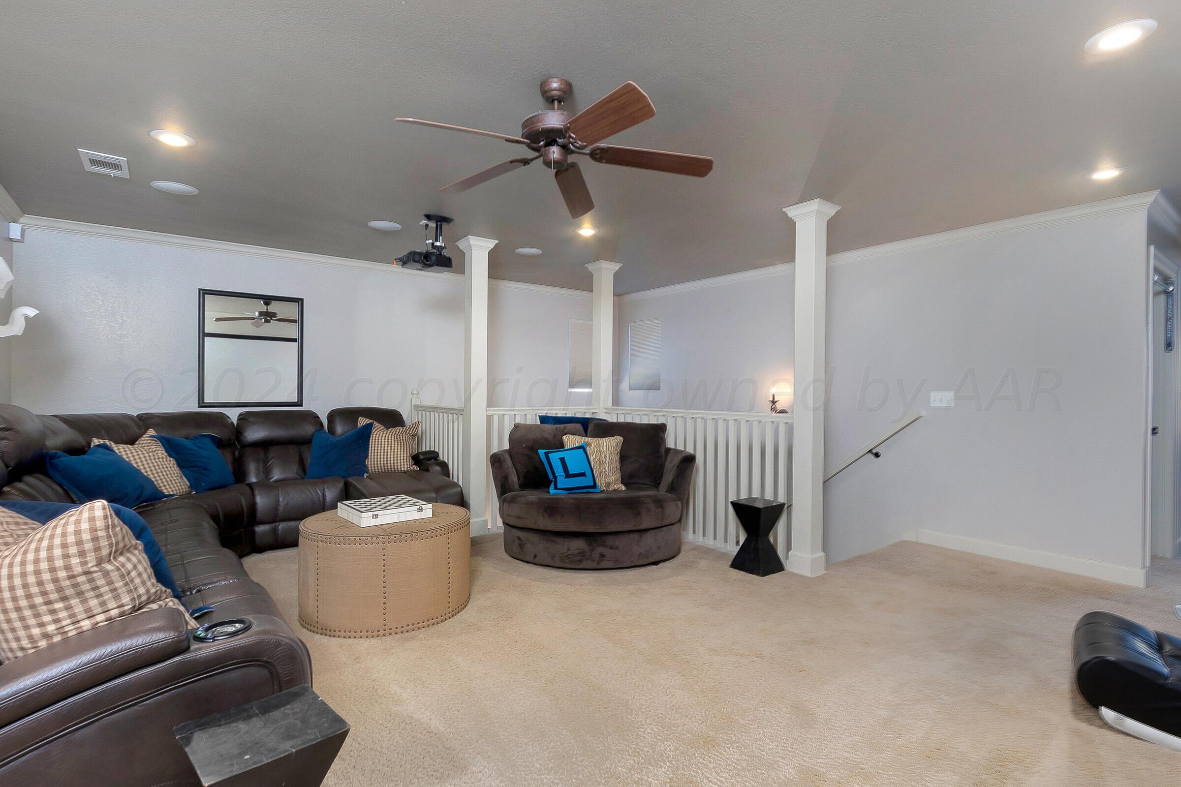 6107 Blue Sage Circle Amarillo, TX 79124 - Photo 55 of 79 a living room with furniture and a ceiling fan