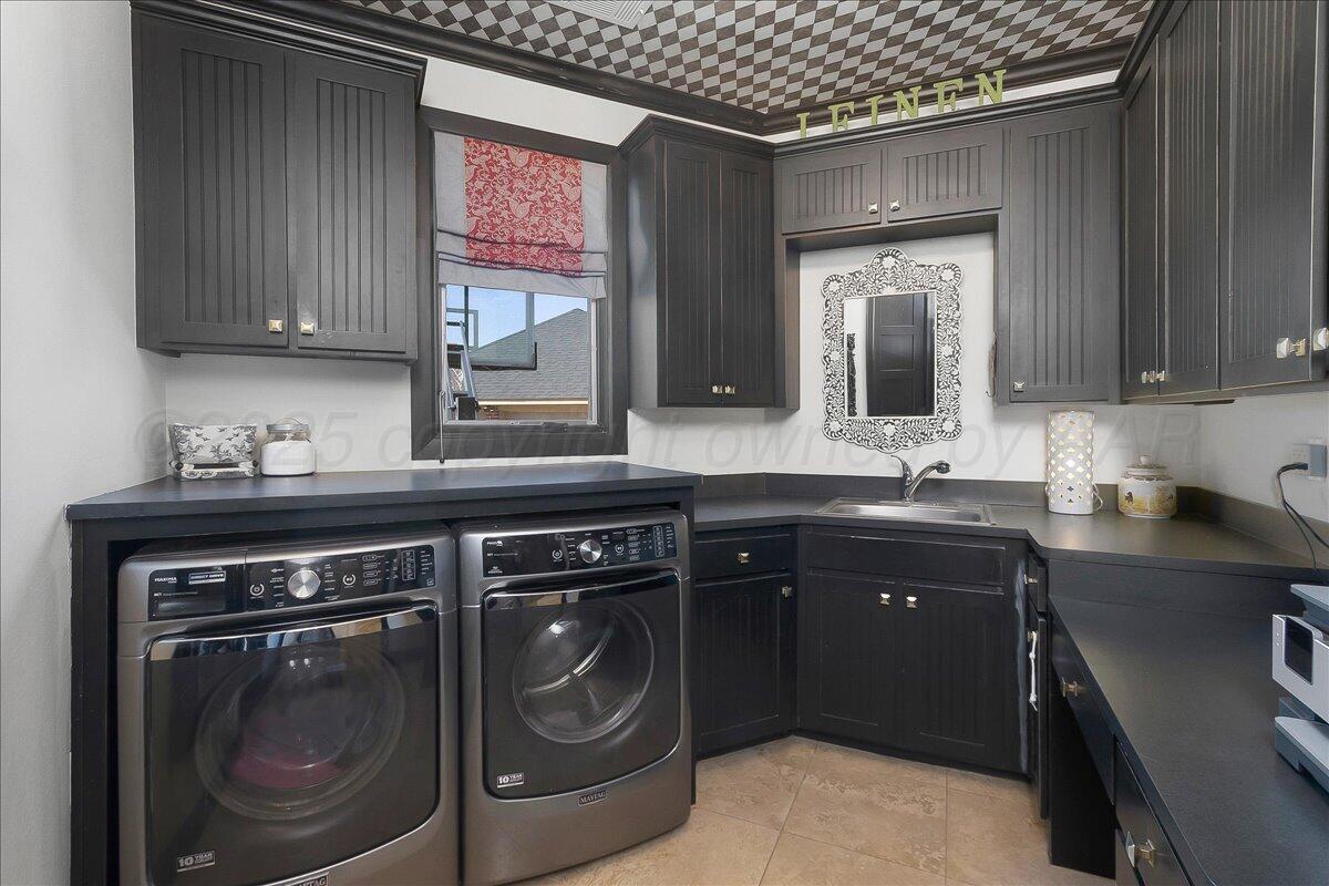 6107 Blue Sage Circle Amarillo, TX 79124 - Photo 69 of 79 a kitchen with a sink cabinets and window