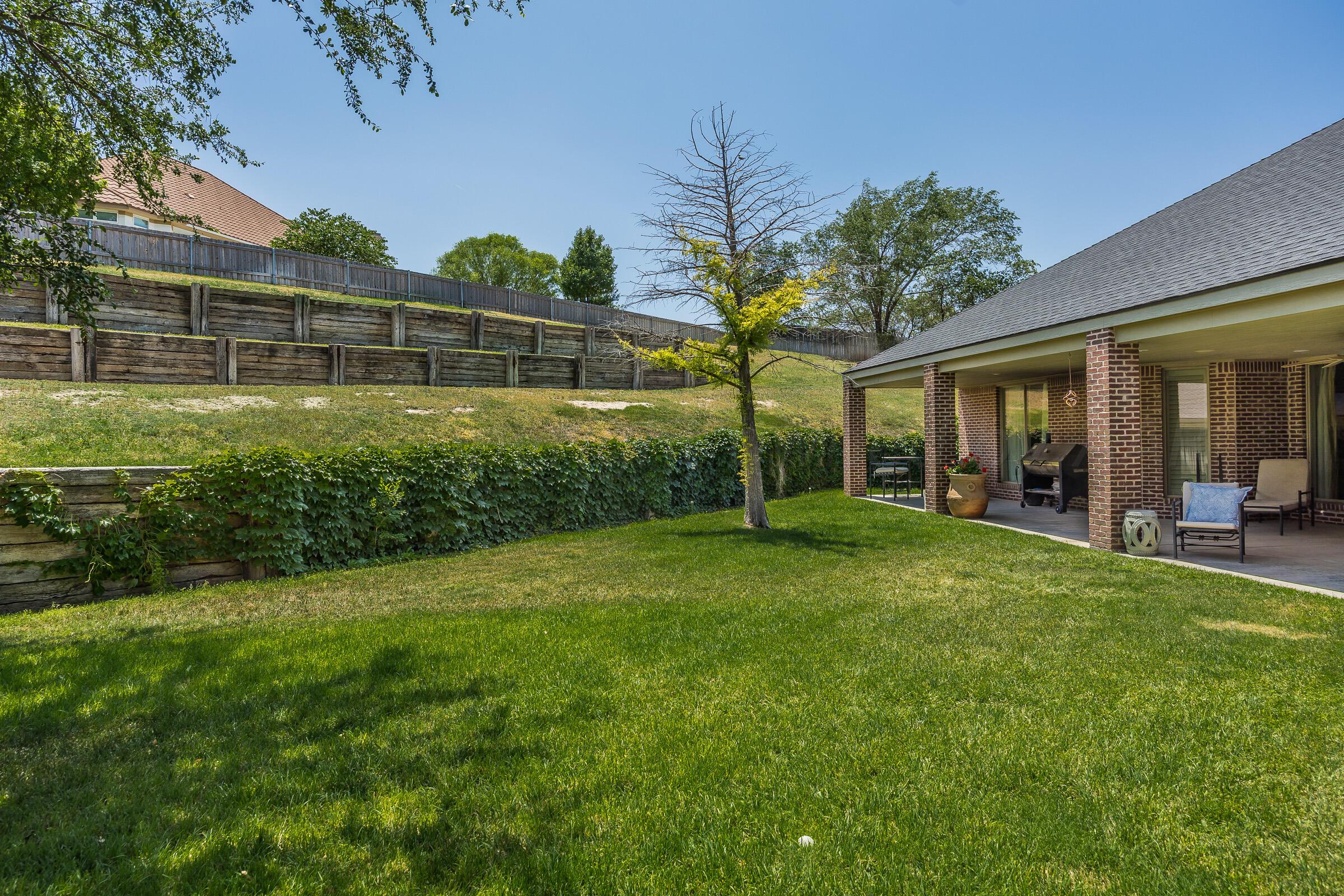 6107 Blue Sage Circle Amarillo, TX 79124 - Photo 75 of 79 a view of a house with a backyard