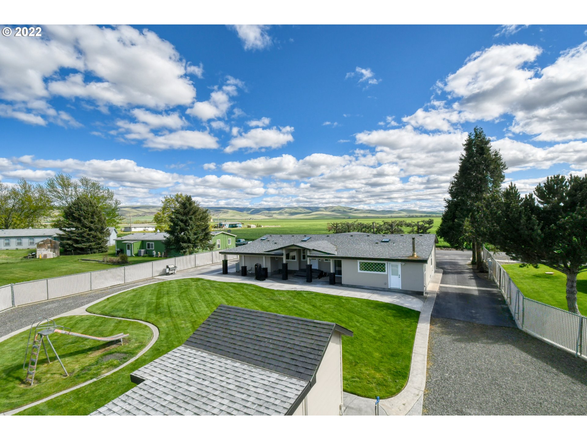 46383 Lloyd Road Pendleton, OR 97801 - Photo 32 of 32 a view of a swimming pool with a patio
