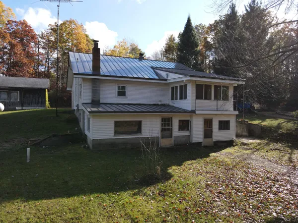 $400,000 | 401 South Bass Lake Avenue, Harrison, MI 48625