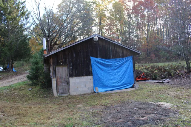 $410,000 | 401 South Bass Lake Avenue, Harrison, MI 48625