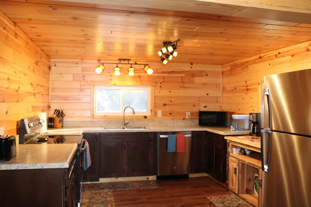 $410,000 | 401 South Bass Lake Avenue, Harrison, MI 48625