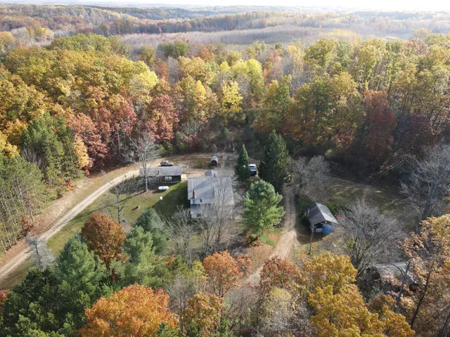 $410,000 | 401 South Bass Lake Avenue, Harrison, MI 48625