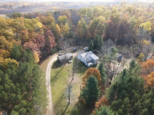 $410,000 | 401 South Bass Lake Avenue, Harrison, MI 48625