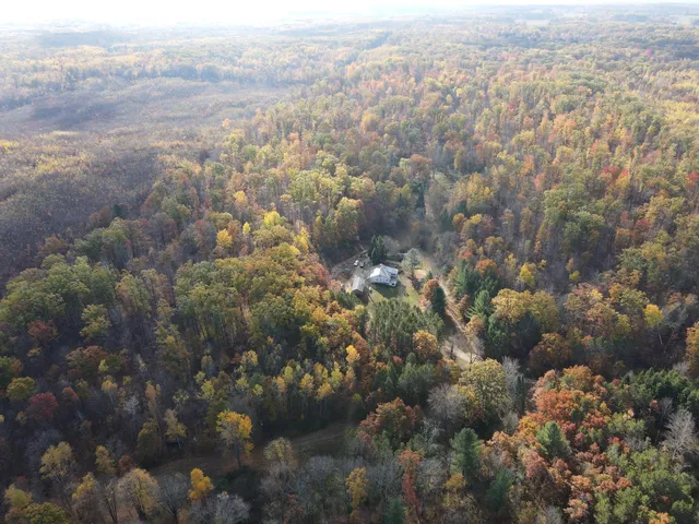 $410,000 | 401 South Bass Lake Avenue, Harrison, MI 48625