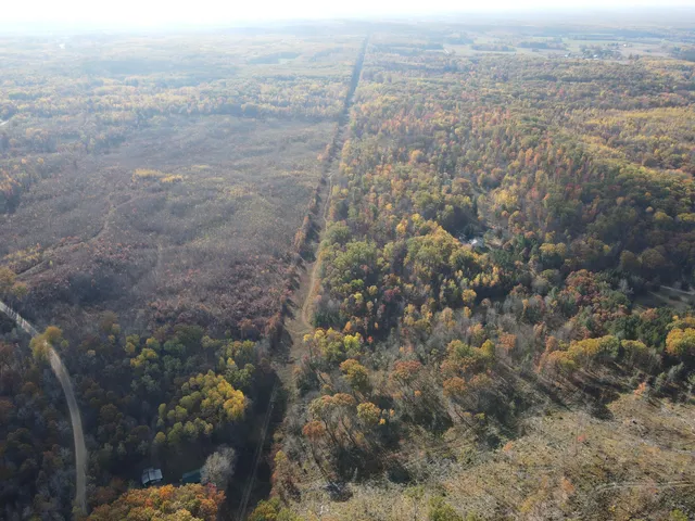 $410,000 | 401 South Bass Lake Avenue, Harrison, MI 48625