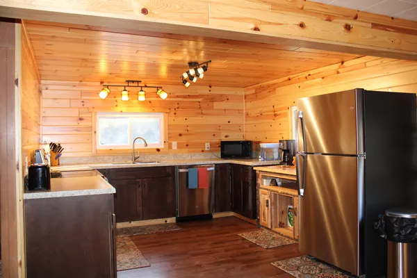 $400,000 | 401 South Bass Lake Avenue, Harrison, MI 48625