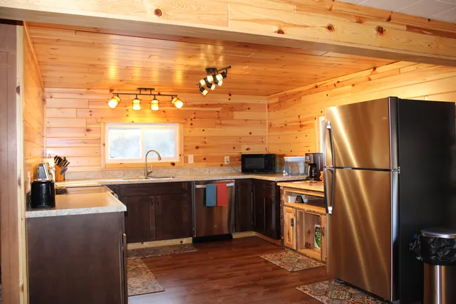 $410,000 | 401 South Bass Lake Avenue, Harrison, MI 48625