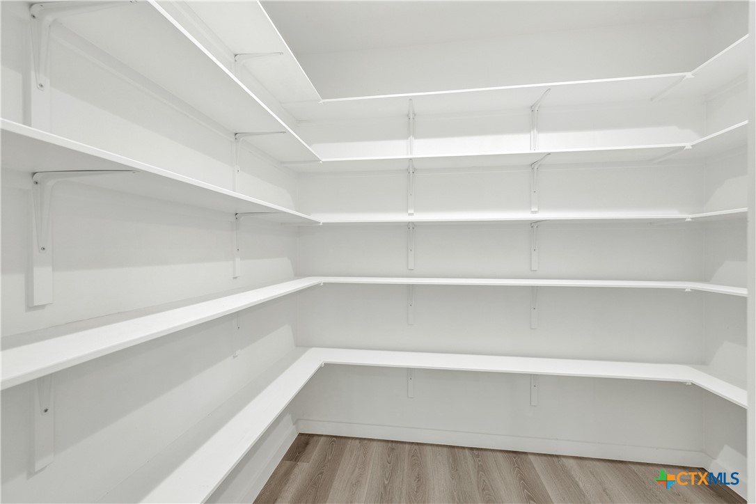 328 Compass Rose Spring Branch, TX 78070 - Photo 21 of 48 a view of walk in closet with empty racks