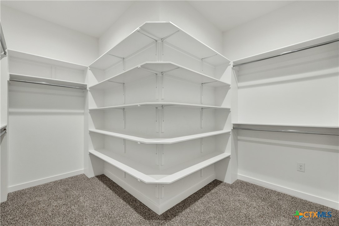 328 Compass Rose Spring Branch, TX 78070 - Photo 32 of 48 a view of an empty walk in closet