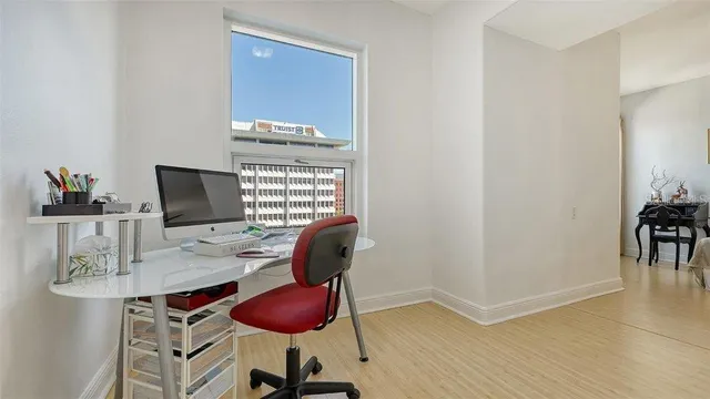 a view of livingroom and dining room with furniture