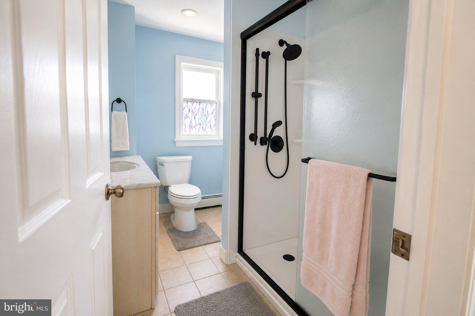100 Grant Street Riverside, NJ 08075 - Photo 21 of 34 a bathroom with a toilet and a shower