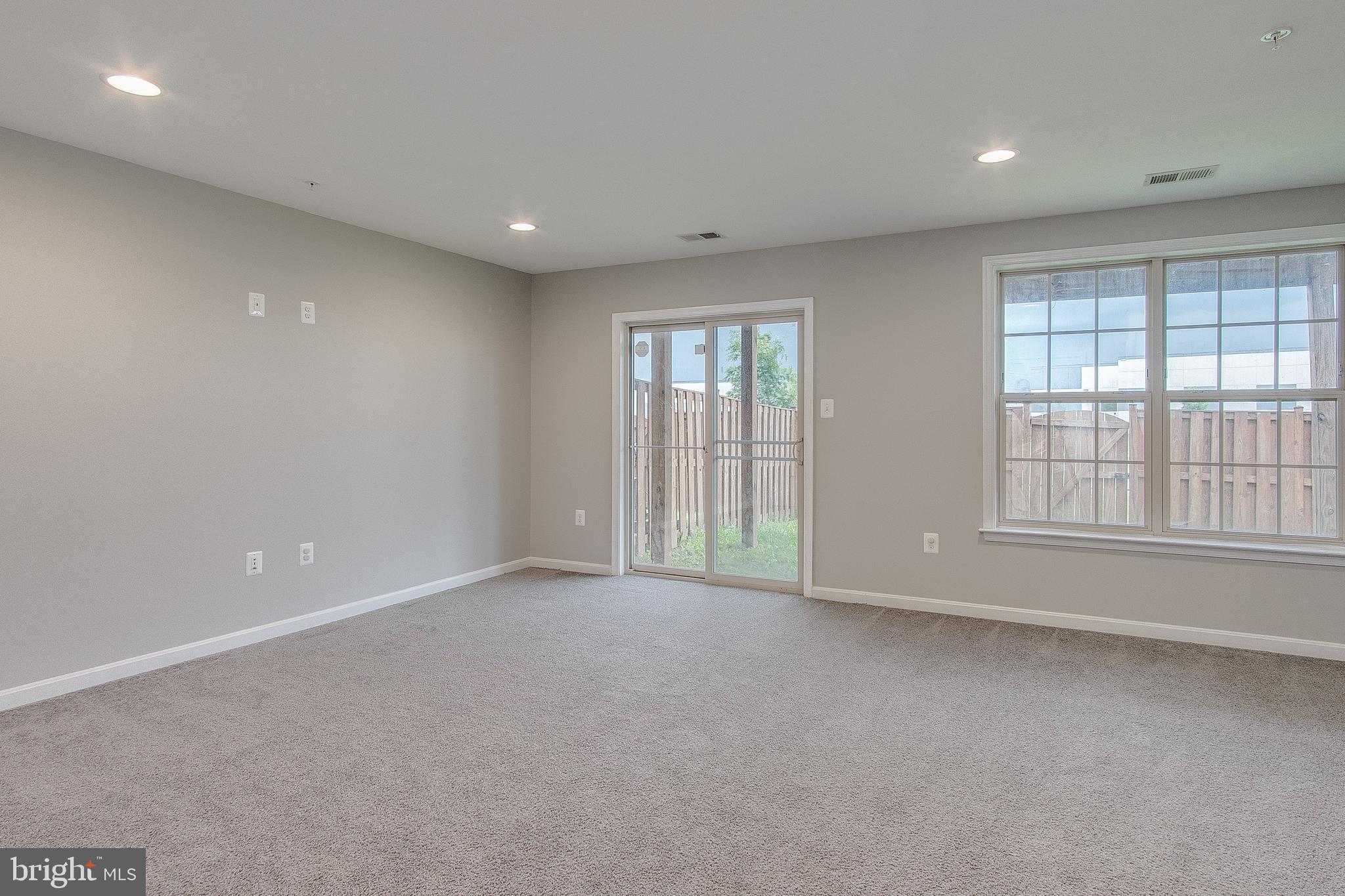 6533 Britannic Place Frederick, MD 21703 - Photo 14 of 30 Lovely Lower Rec Room w/ Walk-Out