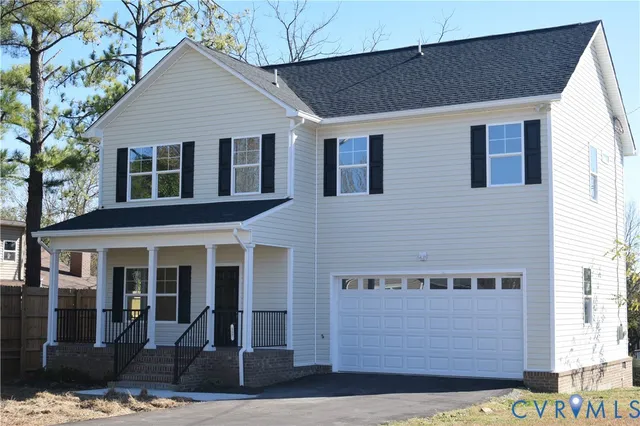 a front view of a house with glass windows
