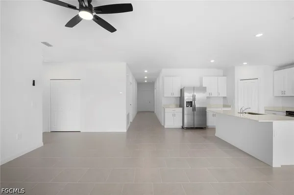 a view of a kitchen with a sink