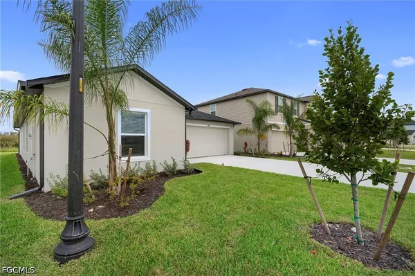 a view of a back yard of the house