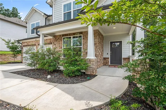 front view of a house with a yard