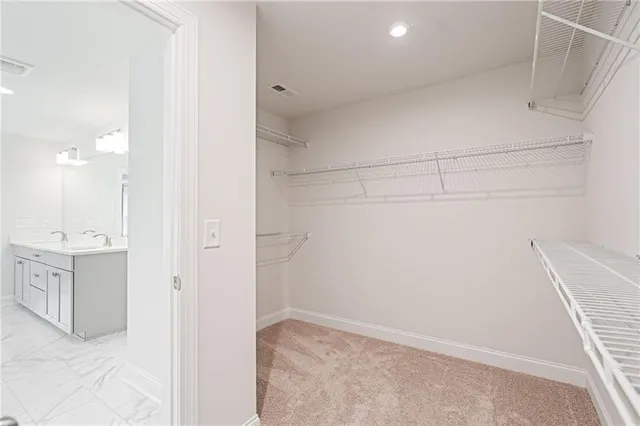 a view of a hallway with closet